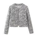 Close-up of sparkling silver sequins on women's tweed jacket with elegant round neckline - XS / Silver