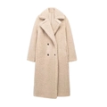 Detailopname van beige fleece jas met reverskraag, dubbele rij knopen en rijke textuur - XS / Broken Wit