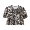 Detail of leopard print blouse featuring front tie bows, puff sleeves and ruffled hem - Leopard Print