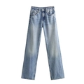 Detailed view of light blue washed denim jeans with classic five-pocket design and texture - Light Blue