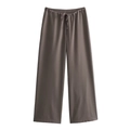 Detail of high-waist wide-leg trousers in dark grey with adjustable drawstring waist - S / Coffee Pants