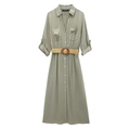 Close-up of sage green linen blend shirt dress featuring woven belt and cargo pockets - XS / Green