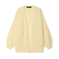 Cremefarbene Strickjacke mit Puffärmeln und Rippbündchen auf weißem Hintergrund - S / Gebrochenes Weiß