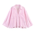 Detail of pink and white vertical striped long sleeve shirt with front pockets and curved hem - Pink Red Striped