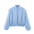 Close-up of light blue bomber jacket with stand collar and textured fabric detail - XS / Blue