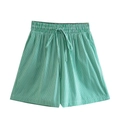 Dettaglio degli shorts casual a righe verdi e bianche con coulisse elastica in vita - S / Pantaloncini Verdi