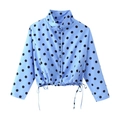 Detailed view of polka dot shirt featuring a stand collar and drawstring hem - S / Blue