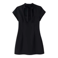 Detalle de vestido negro vintage de lunares con abertura en la espalda y lazo elegante - S / Negro