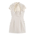 Detail of white polka dot short dress with bow tie collar and teardrop cutout design - White Polka Dot