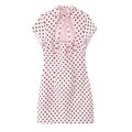 Detailed back view of pink polka dot mini dress with teardrop cutout and elegant bow tie - XS / Pink Polka Dots