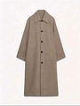 Detail of long brown plaid coat featuring a lapel collar and single-breasted button closure - XS / Light Khaki