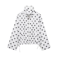 Vue détaillée d'une veste à pois avec ourlet réglable par cordon et boutons blancs - XS / Blanc
