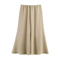 Detailed view of champagne satin midi skirt showing smooth glossy fabric and flowing drapes - Light Khaki