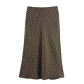 Detailed close-up of dark brown polka dot satin skirt featuring premium draped texture - Green Dot Stone