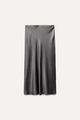 Detailed view of silver grey satin skirt texture with smooth silky fabric and waist label - Gray