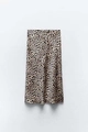 Detailed close-up of leopard print satin midi skirt showing smooth fabric texture and drape - Leopard Print