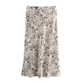 Close-up of leopard print satin midi skirt with high waist design and smooth texture - Spotted Stone