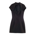 Dettaglio mini abito nero a maniche corte con fiocco chic e design con ritagli - XS / Nero