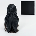 Glossy black satin bandana square scarf displayed as both flat lay and worn on head - Black