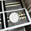 Set of 4 black and beige striped woven placemats with delicate black tassel edges - Black Striped Woven with Tassels