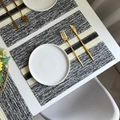 Modern woven paper placemat with black, white, and grey stripes in minimalist style - Black Striped Woven