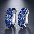 Elegante Silberohrringe mit funkelnden blauen Zirkonia in Tropfenschliff-Form - 9. Platin + Königsblau
