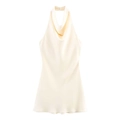 Detail of ivory satin halter top with elegant cowl neck and refined back tie closure - Off White