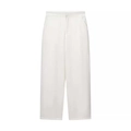 Detail einer weißen High-Waist-Hose mit weitem Bein, elegantem Fall und Seitentaschen - S / Weiße Hose