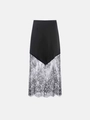 Detailed view of black satin fabric stitched with delicate floral lace on a midi skirt - XS / Black