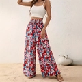Dames zomersethand met witte korte top en wijde broek met hoge taille en bloemenprint - XS / Rood Bloemen