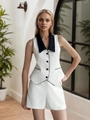 Women's chic white sleeveless vest and shorts set with black contrast lapels and buttons - S / White