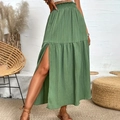 Detailed close-up of sage green high waist skirt featuring pleated fabric and side slit - S / Bean Green