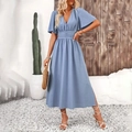 Detail of light blue V-neck maxi dress featuring ruffled sleeves and ruched waist design - S / Light Blue