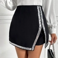 Detail eines schwarzen High-Waist-Minirocks mit silbernen Pailletten und Schlitz - S / Schwarz (Silber Pailletten)