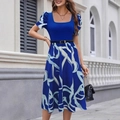 Slim fit dress with royal blue knit bodice and light blue abstract print skirt - S / Blue