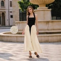 Elegant halter neck dress in black and beige contrast design for a slim fit silhouette - S / Black and White