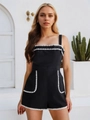 Elegant black sleeveless women's romper featuring white scalloped embroidery trim - S / Set / Black