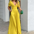 Tuta da donna giallo brillante con scollo a V, maniche a sbuffo e gamba larga elegante - S / Giallo