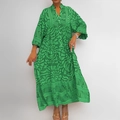 Women's green floral V-neck maxi dress with long sleeves and geometric print patterns - Green
