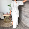 Detail of white V-neck maxi dress featuring adjustable drawstring waist and side slit detail - White