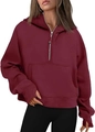 Detail of wine red half-zip hoodie featuring thumbholes and a cozy kangaroo pocket - Burgundy