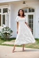 Detail of white square neck puff sleeve dress with smocked bodice and tiered skirt - S / White