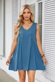 Detail of blue V-neck sleeveless dress featuring unique pleated design and side pockets - Blue