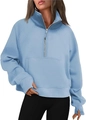 Detail view of light blue half-zip sweatshirt featuring thumbholes and stand collar - Light Blue