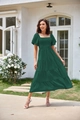 Close-up detail of dark green square neck dress with smocking and puff sleeves - S / Green