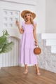 Detail of lavender tiered dress with ruffle sleeves and textured pleats in outdoor setting - Light Purple