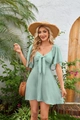 Detail of mint green V-neck mini dress showing bow-tie front and ruffled short sleeves - Bean Green