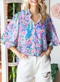 Close-up of floral print shirt featuring puff sleeves and elastic cuffs for women - Artistic Abstract Floral (Image 6)