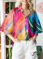 Detail of colorful abstract print shirt with classic collar and lantern sleeves on model - S / Multicolor Abstract Patchwork (Image 4)