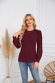 Detail of burgundy top featuring lace-spliced long sleeves and pleated crew neckline - Burgundy